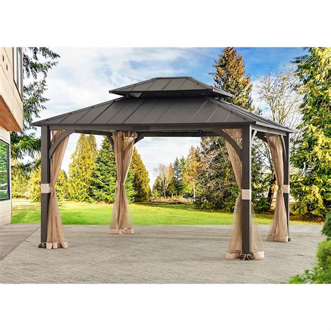 Contact information for aktienfakten.de - This 12' x 10' pergola creates the perfect outdoor setting. Arched roofline compliments any outdoor space with just the right amount of light filtering from the polyester canopy. Generous interior space accommodates a variety of furnishing arrangements. 